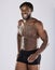 Black man, fitness and happy body portrait of sports person in studio for strong muscle and underwear. Health and