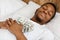 Black Man Sleeping Holding Money Hugging Cash Lying In Bed