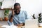 Black manager makes business call talking with client