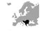 Black map of Balkan peninsula countries on gray Europe map