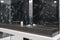 Black marble bathroom, panoramic, closeup