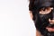 Black mask on man face, well groomed man getting spa treatment. Handsome young guy get Moisturizer rejuvenating black mask on