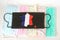 Black medical mask with picture of French Flag in Map Shape. Black medical mask is a symbol of mortal danger of