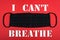 Black medical mask on a red background with text I can`t breathe