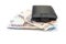 Black men`s wallet and stacks with 1000 and 500 hryvnia. White background.