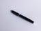 Black metal business fountain pen with cap closed on white background