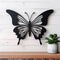 Black Metal Butterfly Art On Wooden Surface: Decorative, Extruded, Handcrafted Design