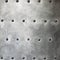 Black metal plate or armour texture with rivets