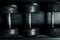 Black metallic or steel heavy dumbbells, weightlifting equipment for weight training, sport