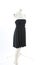 Black mini dress on Headless Mannequin Cloth Display Dressmaker doll figurine. Fashion designer clothes.