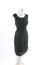 Black mini dress on Headless Mannequin Cloth Display Dressmaker doll figurine. Fashion designer clothes.