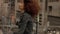 Black mixed race woman with big afro curly hair in outdoor city