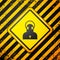 Black Monk icon isolated on yellow background. Warning sign. Vector