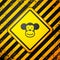 Black Monkey icon isolated on yellow background. Animal symbol. Warning sign. Vector