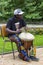 : Black musician from Africa demostrates how to play the drums