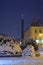 Black obelisk and fountain at Banska Bystrica during winter