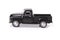 Black old style model pickup truck on white background