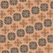 Black and orange patterns on the coral background