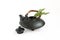 Black oriental teapot and tea leaves