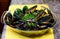 Black pasta with baked green mussel