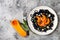 Black pasta with roasted butternut squash, parmesan cheese and fried sage. Halloween black and orange party dinner concept