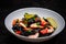 Black Pasta - Squid Ink, with Prawns, Seafood,Lemon and Tomatoes in White Bowl on  Dark Background. Top view