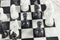 Black pawn gives checkmate to white king. Marble chess board