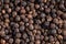 Black pepper closeup. Top View