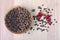 Black pepper in a wooden bowl