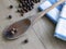 Black pepper on wooden spoon and dishcloths