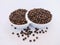 Black peppercorn blackpepper whole seeds grains  hot indian spice natural food ingredient cooking masala kali mirch stock photo