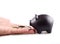 Black piggy bank with money