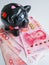 Black piggy bank standing next to Chinese 100 rmb banknotes on a
