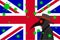 Black plague doctor surrounded by viruses with copy space with UNITED KINGDOM flag UK