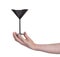 Black plastic coctail glass in hand