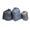 Black plastic garbage isolated white