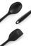 Black plastic and silicone kitchen spatula and spoon on white