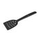 Black plastic slotted spoon on white.