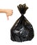 Black plastic trash bag, tied junk pack, garbage package