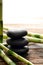 Black Polished Massage Stones Cairn and Spa Bamboo