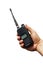 Black portable walkie-talkie radio on hand isolated  white background with cilpping path