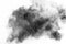 Black powder explosion against white background. Charcoal dust particles cloud in the air