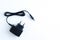 Black power cord with euro plug on white background