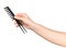 Black professional comb in female hand