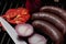 Black pudding with onion and pepper