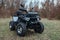 black quad bike on green grass