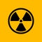 Black radiation symbol isolated on yellow background