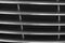 Black radiator grille. Grid of car close-up, texture, background