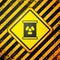 Black Radioactive waste in barrel icon isolated on yellow background. Toxic refuse keg. Radioactive garbage emissions
