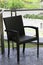 Black rattan chair on the terrace